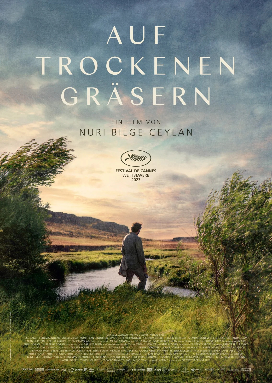 Filmplakat: Auf trockenen Gräsern